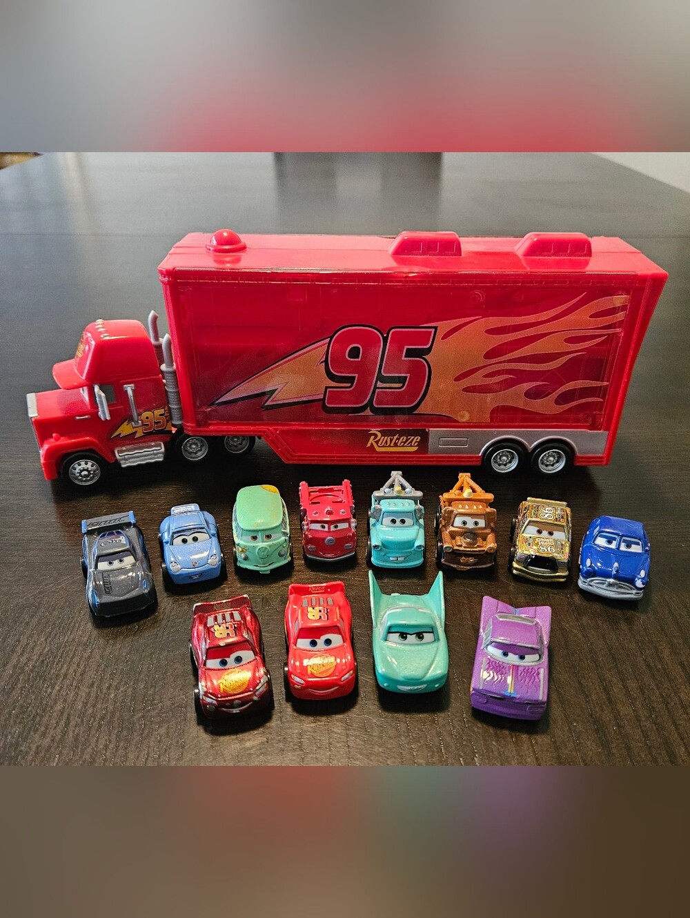 Disney Pixar Cars Mini Racers Mack Truck Transporter Hauler Lot